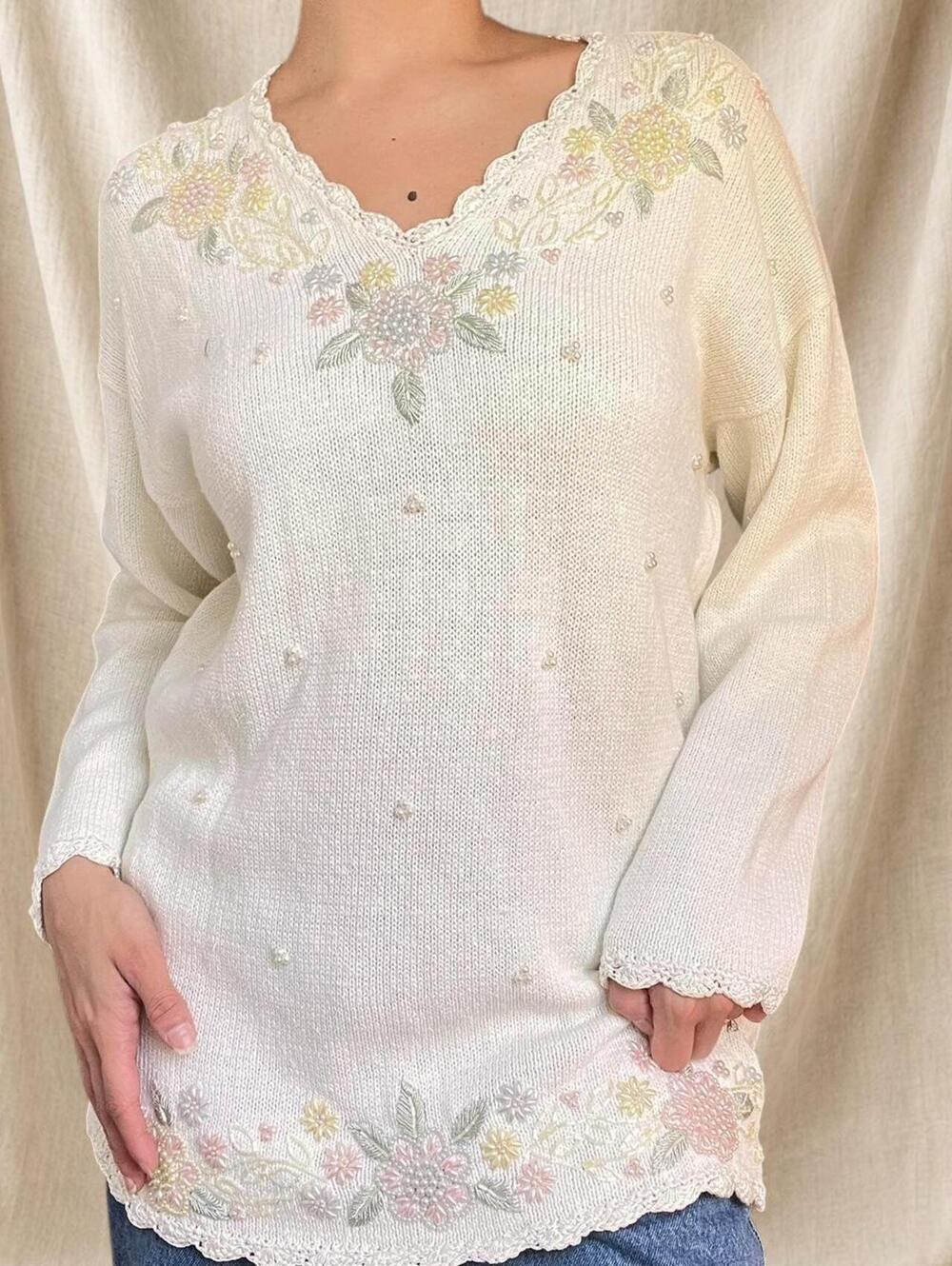 Vintage knit sweater with embroidered floral design and pearl embellishments